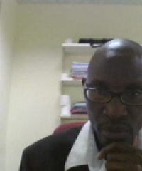 Dr Minyoi in his UB office